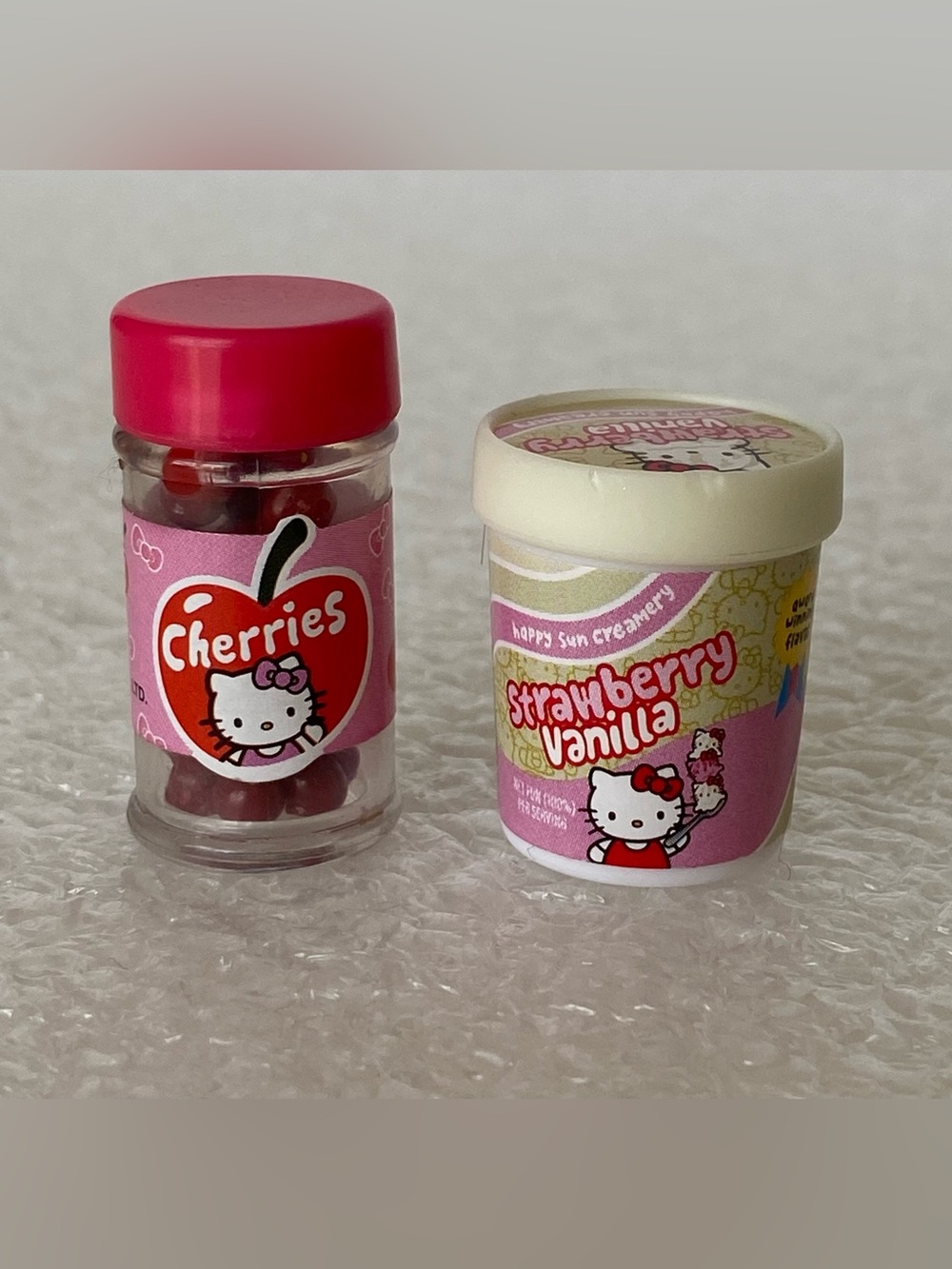 MGA's Miniverse Make It Mini Food Hello Kitty
Collectibles Cherries & Ice Cream